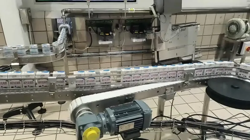 Sistem Conveyor untuk Industri Produk Susu